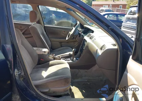 1999 Toyota Camry Le z USA, uszkodzony, nr VIN JT2BG22K4X0307527